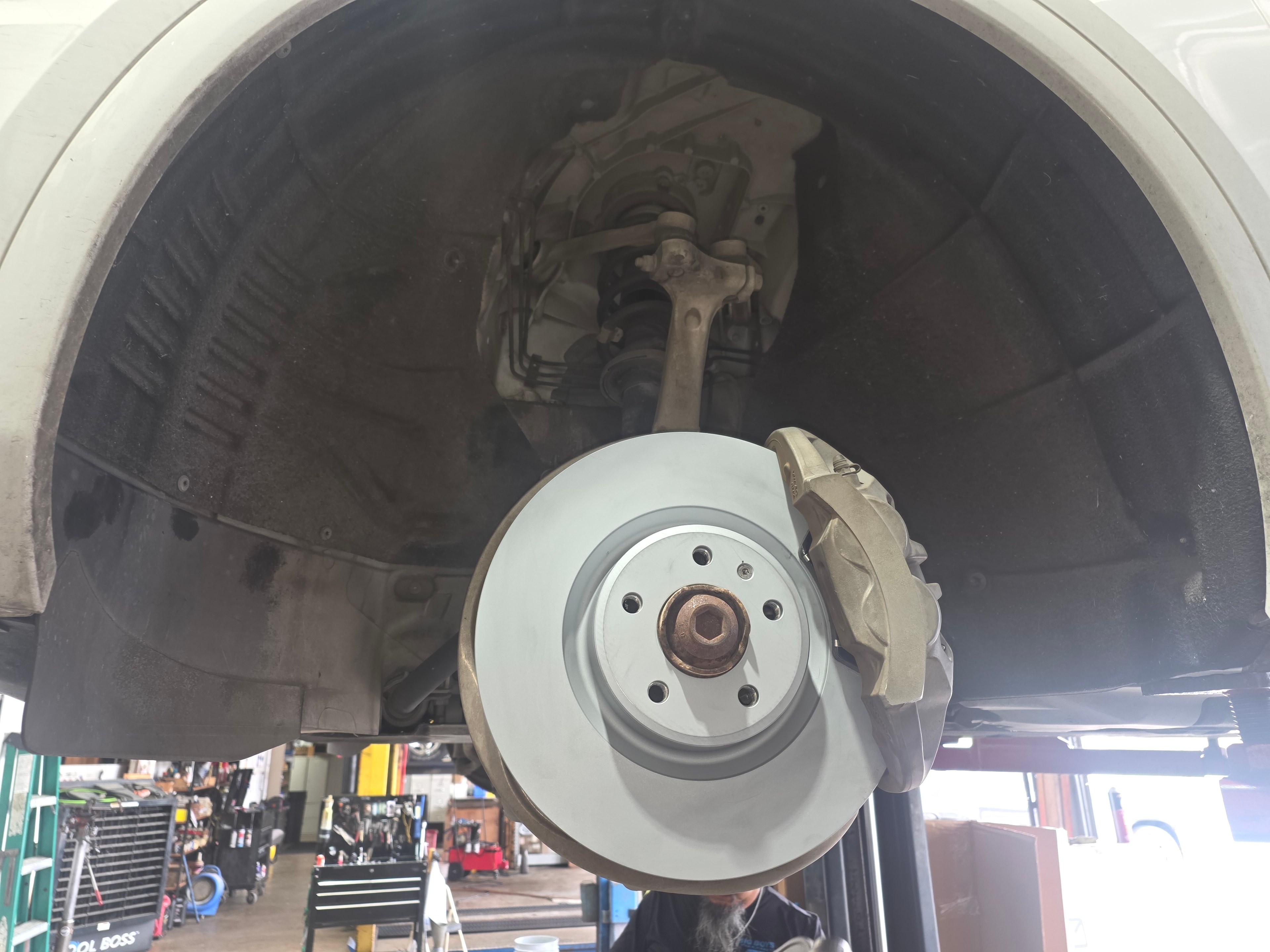 New brake rotor and caliper assembly after brake service at Riley Auto Care in San Marcos TX