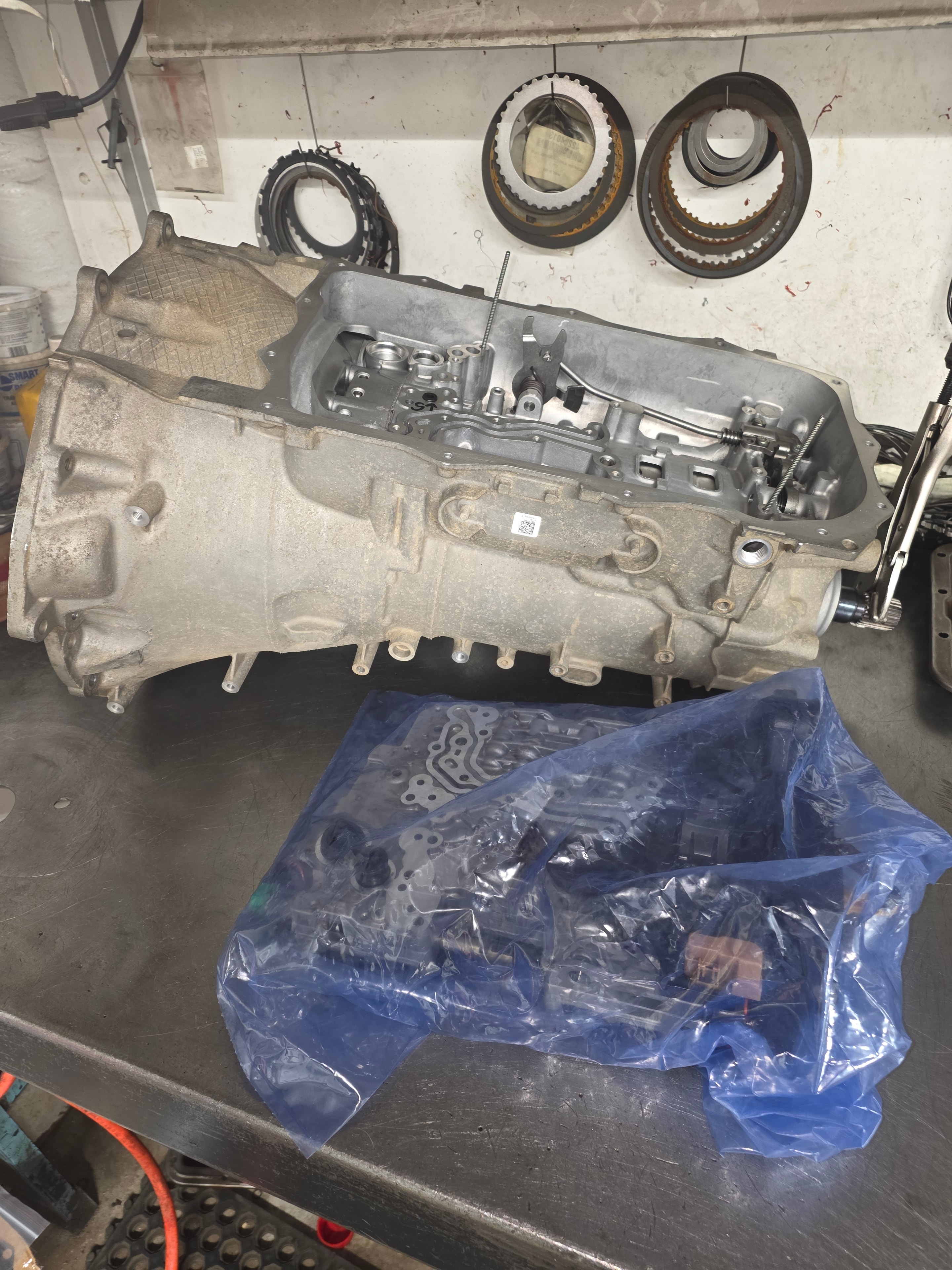 Transmission valve body disassembled for inspection at Riley Auto Care San Marcos TX